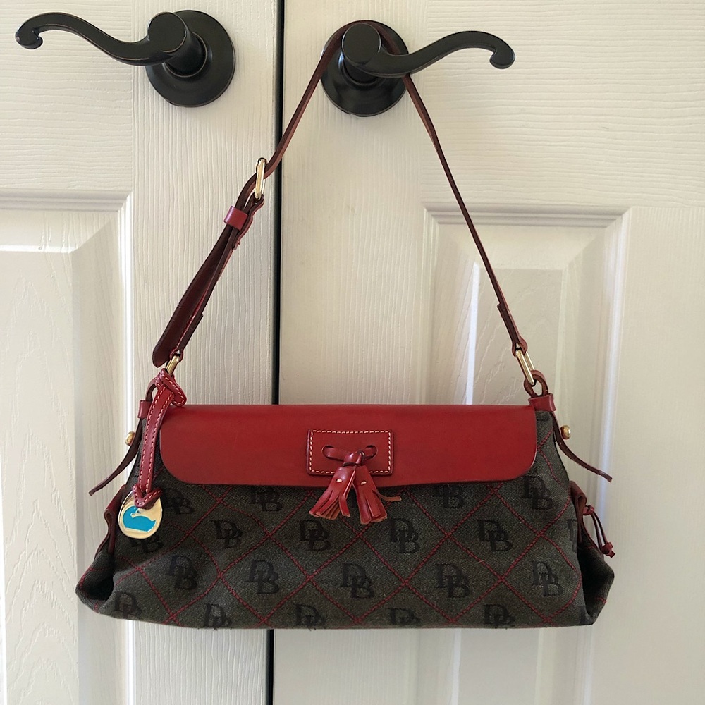 Dooney & Bourke leather flap tassel bag with signature “DB” pattern